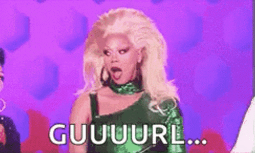 a drag queen in a green dress is making a funny face and saying guguuurl .