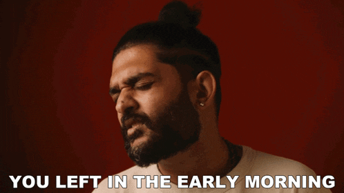 a man with a beard making a face with the words you left in the early morning