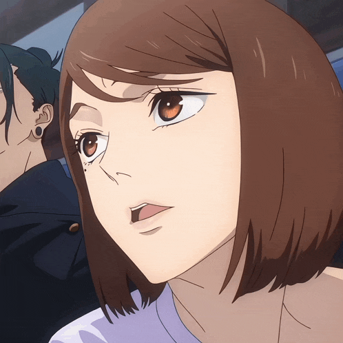 a close up of a girl with brown hair