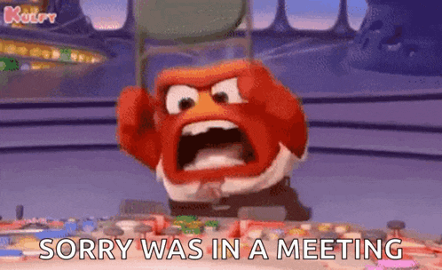 an angry bird from inside out is sitting in a chair with its mouth open .