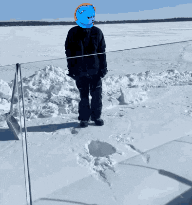 a man in a black jacket and black pants stands in the snow