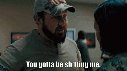 a man talking to a woman with the words you gotta be shitting me
