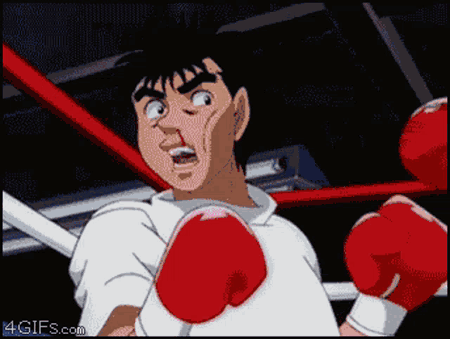 a pixelated image of a man wearing red boxing gloves with the website 4gifs.com in the corner