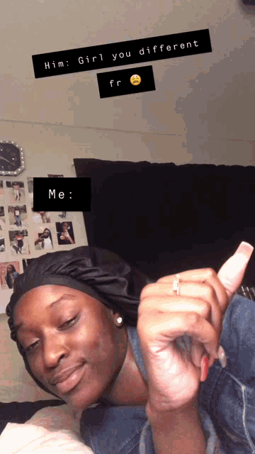 a woman laying on a bed with a sticker that says " him girl you different fr me "