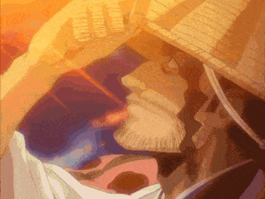 a man with a beard wearing a straw hat and a white shirt