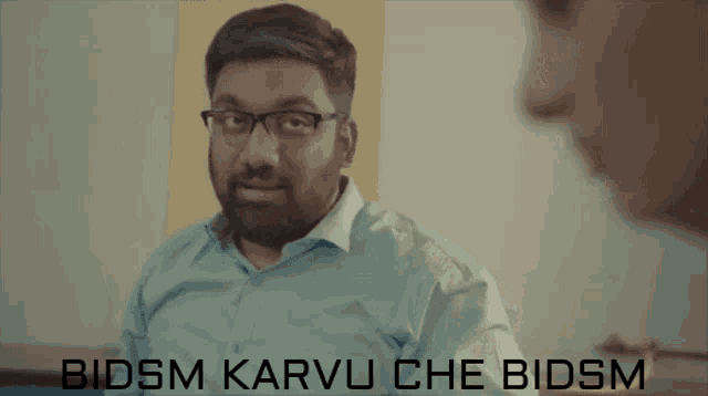 a woman is holding a baby while talking to a man with the words bidsm karvulche bidsm on the bottom