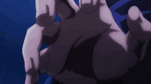 a close up of a person 's hand with a dark background