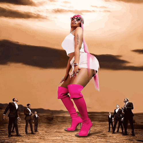 a woman with pink hair and pink boots stands in front of a group of men in suits