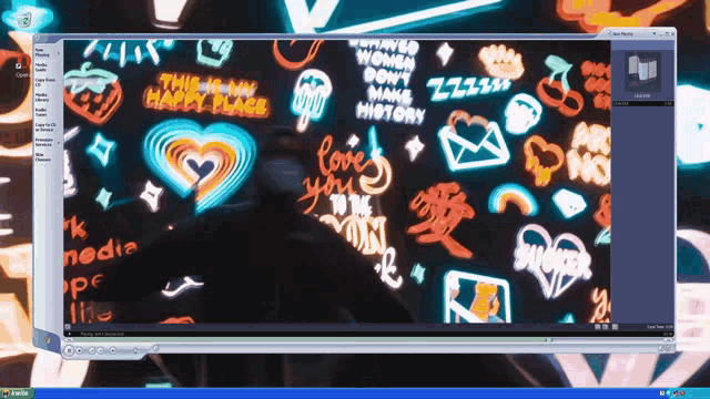 a computer screen shows a neon sign that says love you