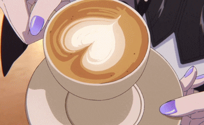 a person with purple nails is holding a cup of cappuccino on a saucer