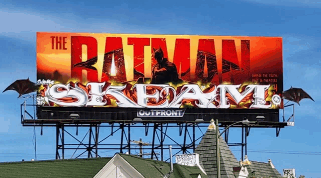 a billboard that says the batman skeavin on it