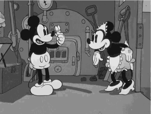 a cartoon of mickey mouse and minnie mouse standing next to each other