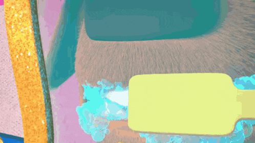a yellow brush with blue foam on it is being used to brush a beard
