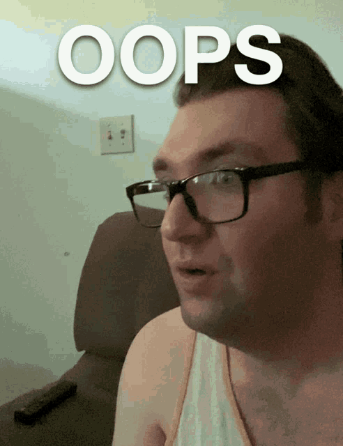 a man wearing glasses has the word oops written on his face