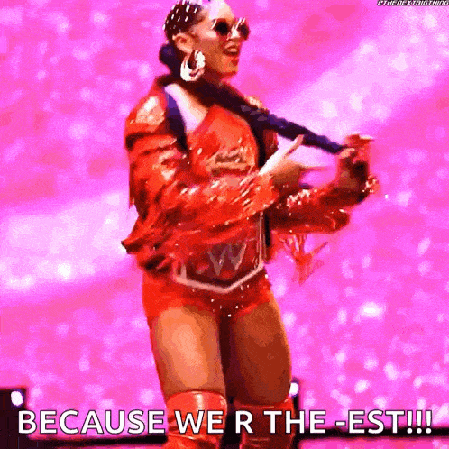 a woman in a red outfit is dancing with the words because we 're the est !!