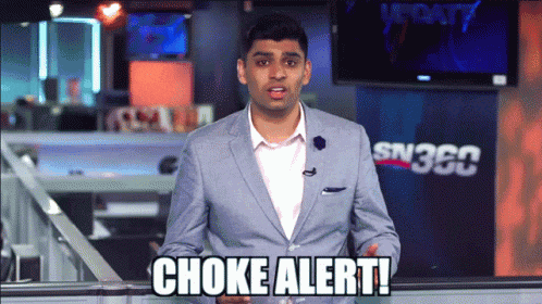 a man in a suit says choke alert in front of a sn360 sign