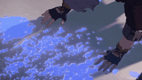 a person 's hands are reaching out towards a body of water with the letters hsr on the bottom right
