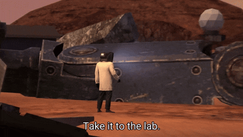 a man in a white coat is standing in front of a large metal object with the words take it to the lab below him