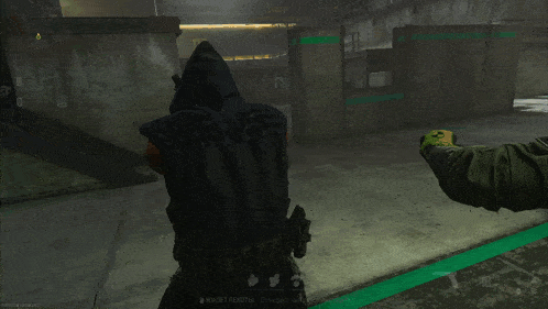 a screenshot of a video game shows two soldiers fighting in a room