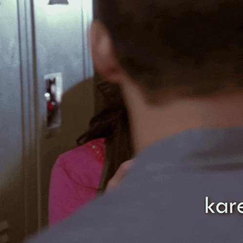 a close up of a person 's back with the word kare visible