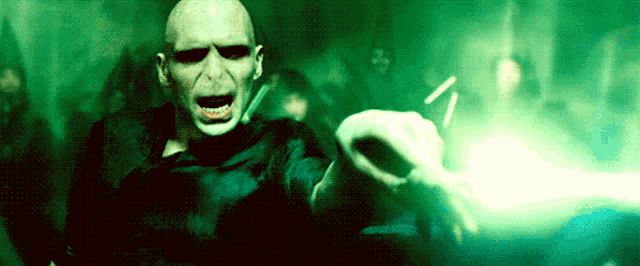 voldemort from harry potter is holding a lightning bolt in his hand