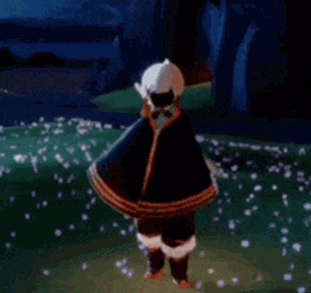 a person in a video game is holding a sword in their hand .
