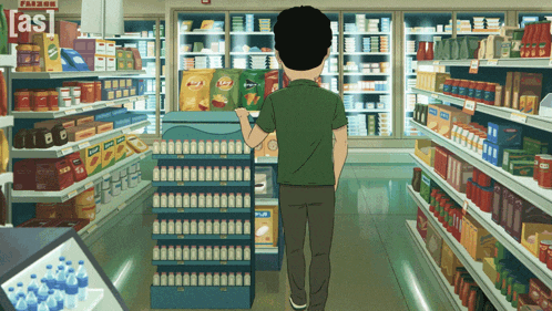 a man in a green shirt is walking through a grocery store aisle with a sign that says [ as ] on it