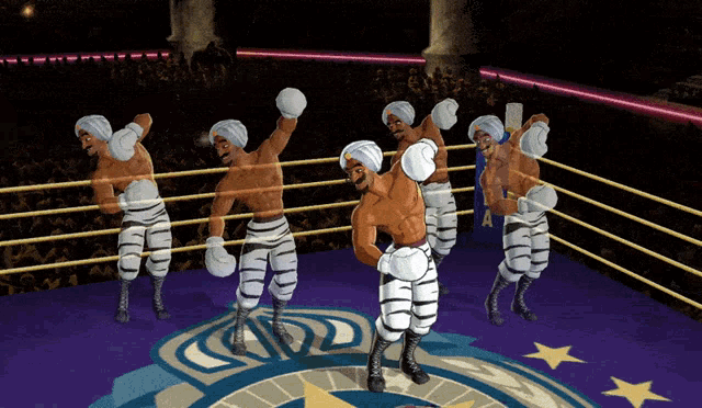 a group of men in boxing gloves are standing in a boxing ring