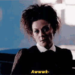 a woman with a messy haircut is sitting in a chair and says awwwk- .