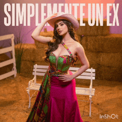a woman wearing a pink dress and a cowboy hat stands in front of hay bales and a white bench
