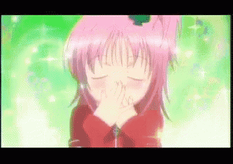 a pixelated image of a girl with pink hair covering her mouth