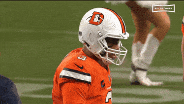 a football player wearing a helmet that says nfl network on it