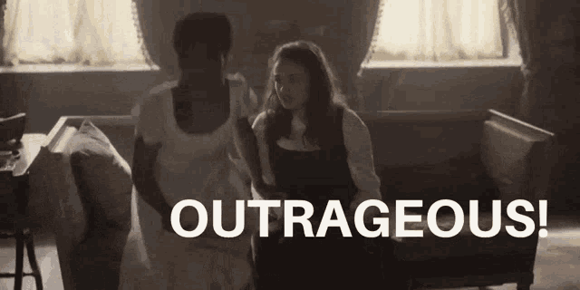 two women are standing next to a couch with the word outrageous written on the bottom