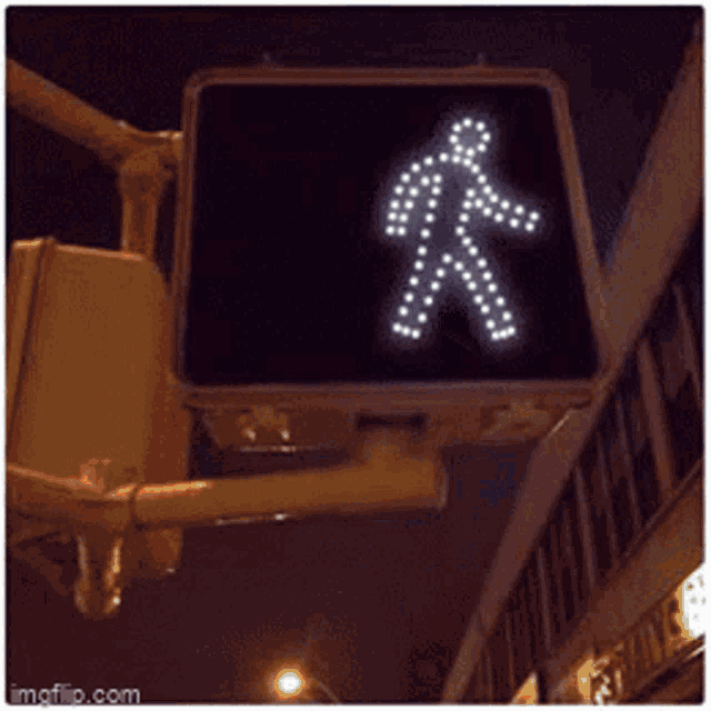 a picture of a pedestrian crossing sign that says breaking through o's