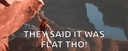 a man is climbing up a rock with the words they said it was flat tho