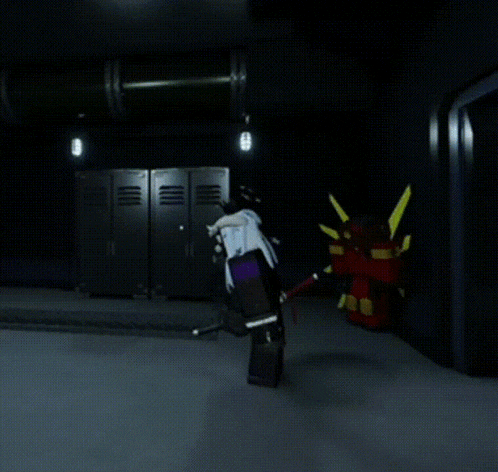 a person standing in a dark room with lockers behind them