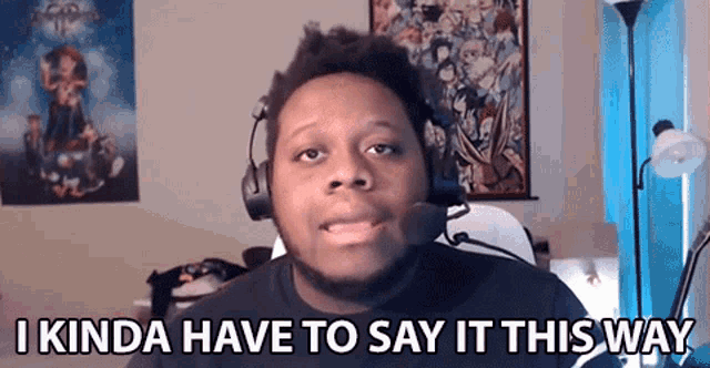 a man wearing headphones and a microphone says i kinda have to say it this way