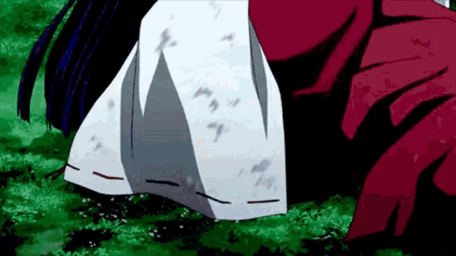 a close up of a person 's feet in a field of grass .