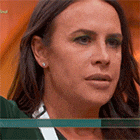 a close up of a woman 's face with a green border