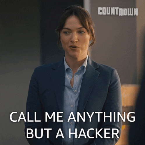 a woman in a suit says call me anything but hacker
