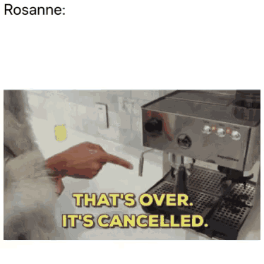 a person is pointing at a coffee machine that says that 's over it 's cancelled