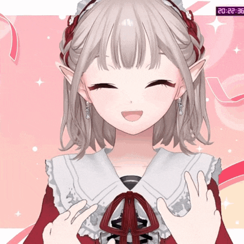 a girl in a red dress is smiling with a time of 20:22 on the bottom right