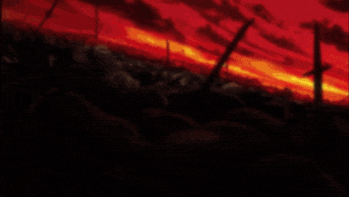 a sunset with a bunch of fences in the foreground