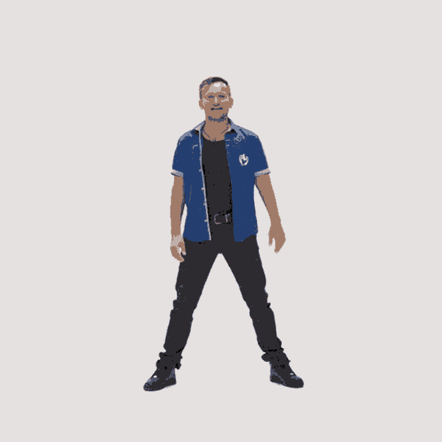 a man in a blue shirt has his arms outstretched in the air