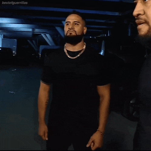 a group of men are standing in a parking garage with the hashtag bestofguerrillas on the bottom left