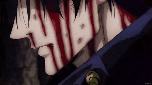 a close up of a man 's face with blood on it