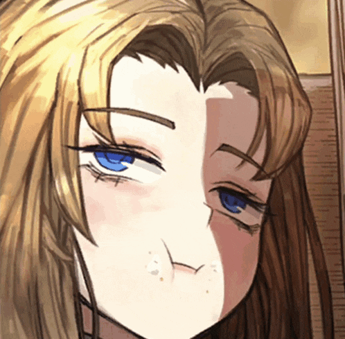 a close up of a girl 's face with blue eyes and brown hair