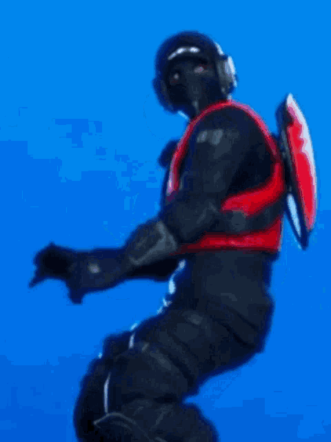 a man in a red vest is dancing in a video game .
