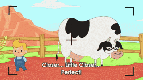 a cartoon of a boy standing next to a cow that says closer