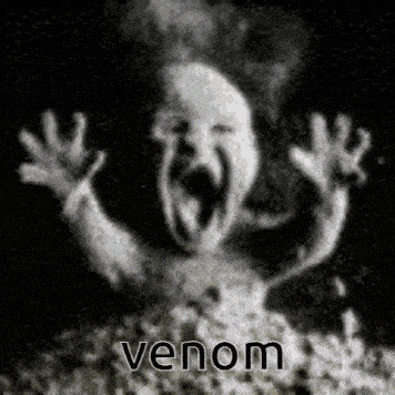 a black and white photo of a ghost with venom written on it